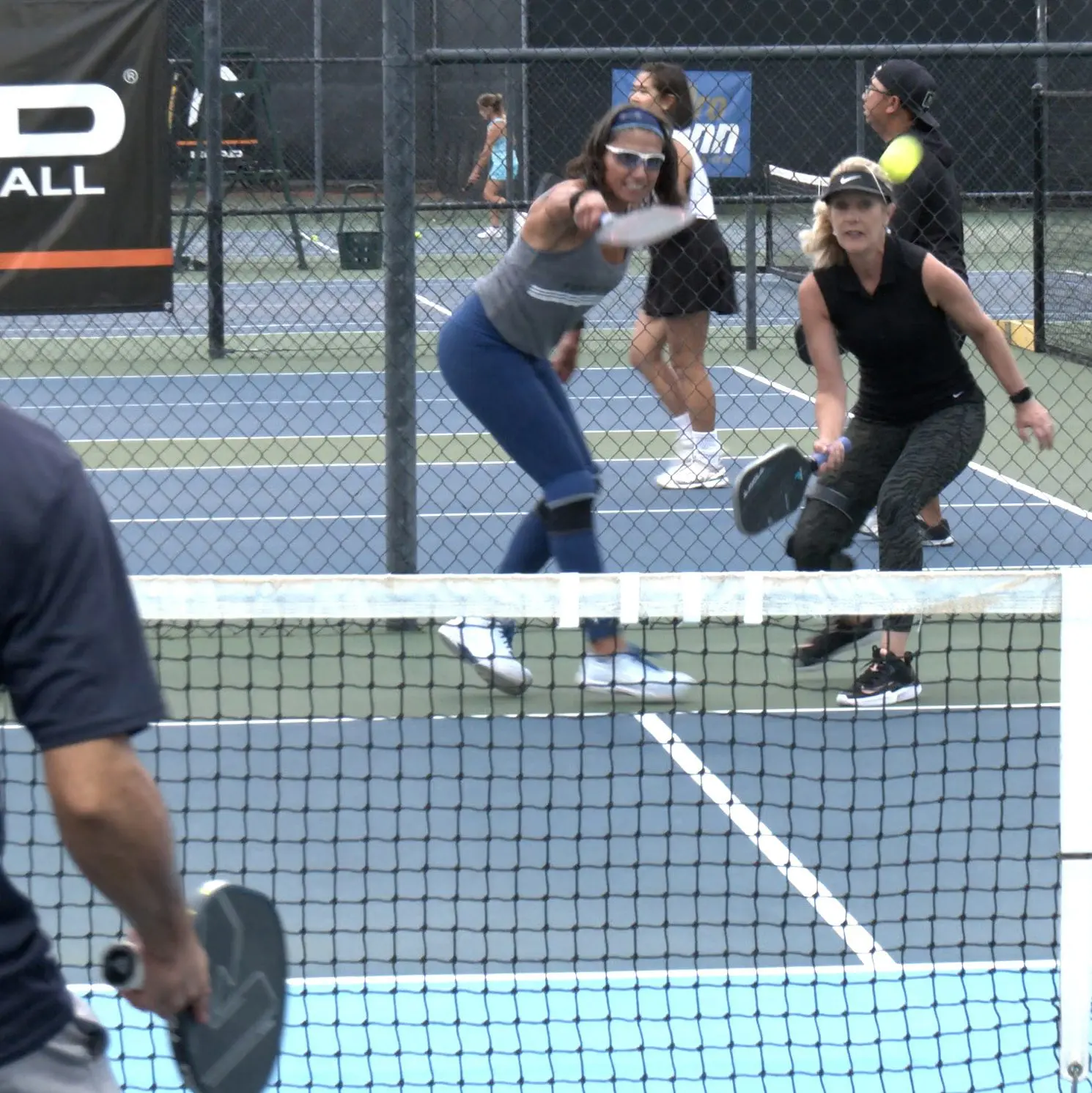 Players competing during Anaheim Pickleball Programs doubles play at Anaheim Tennis and Pickleball Center