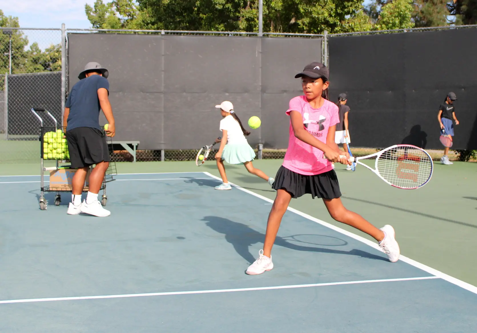 Junior tennis player training at Anaheim Tennis and Pickleball Center