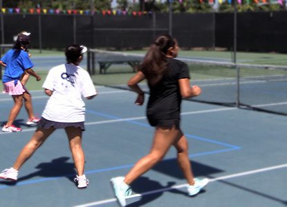 Tennis Girls running