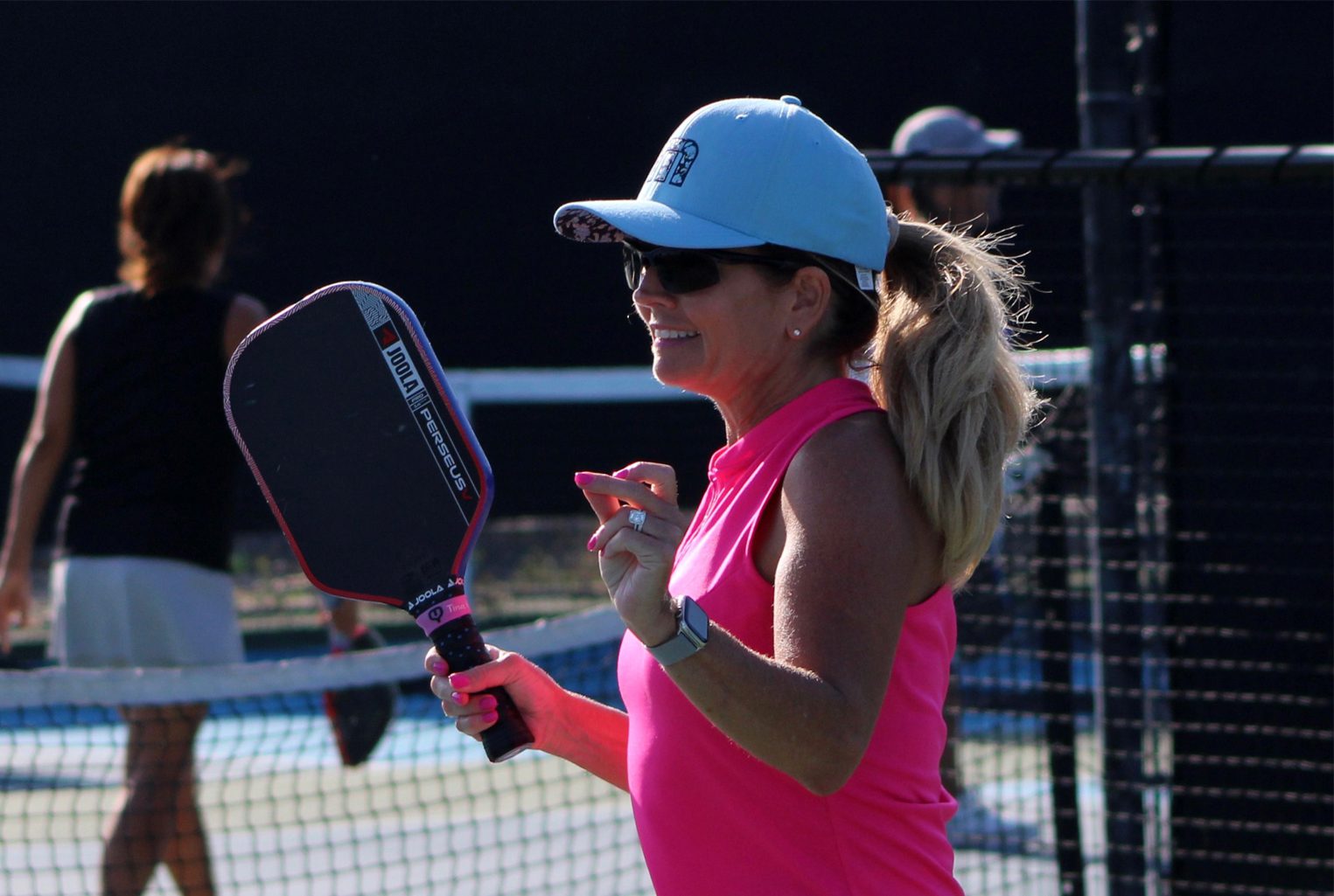 Pickleball lady smiling